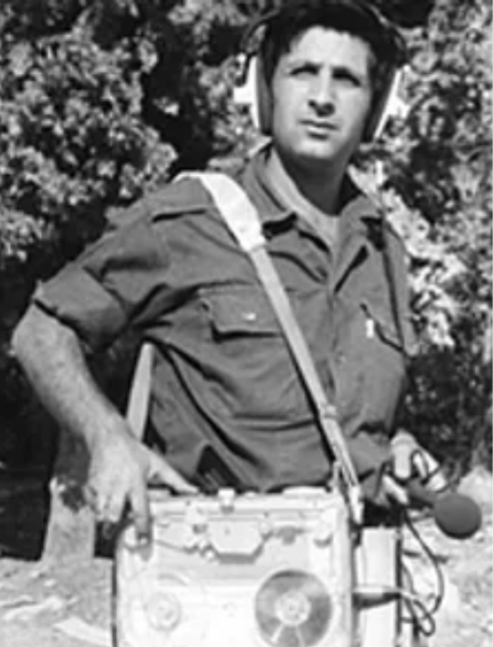 Young Avi Yaffe with recording equipment 